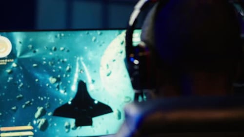Gamer Navigating Universe in Simulation Game Close Up
