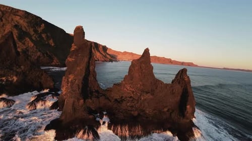 POV Drone Over Reynisdrangar Basalt Rock