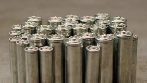 Stacked AA Batteries Close Up Zoom