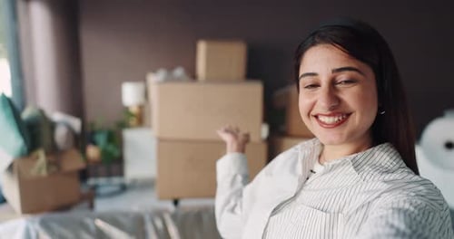 New home, video call and woman with smile, boxes and showing with real estate