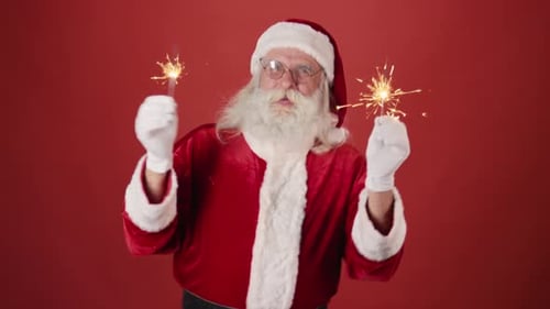 Santa Claus Celebrates with Sparklers