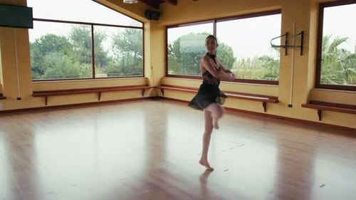 Ballet Dancer Practicing in Dance Studio