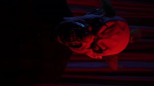 Scary Clown in Front of Camera Horror Concept Vertical Video