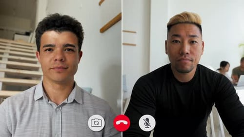 Two Young Adults Having a Video Conference