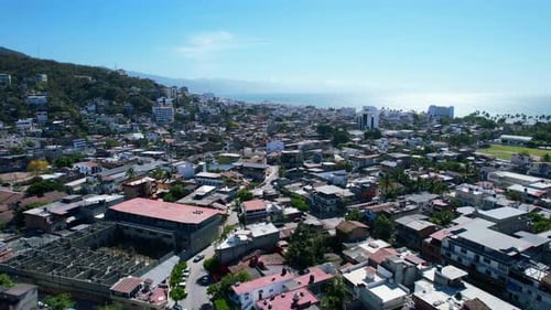 Mexican beach town of Puerto Vallarta skyline on sunny summer day, aerial