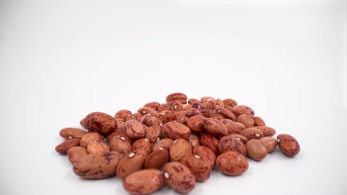 Heap of Dried Pinto Beans on White Surface