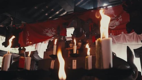 Traditional Candles At Fushimi Inari Shrine Temple Complex In Kyoto Japan. Slow Motion Shot