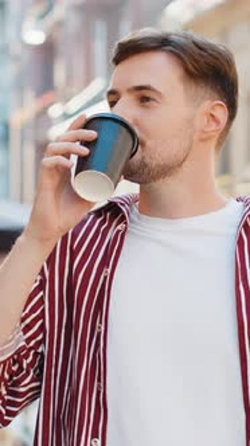 Handsome Adult Man Enjoying Drinking Morning Coffee Hot Drink Relaxing Taking a Break on City Street