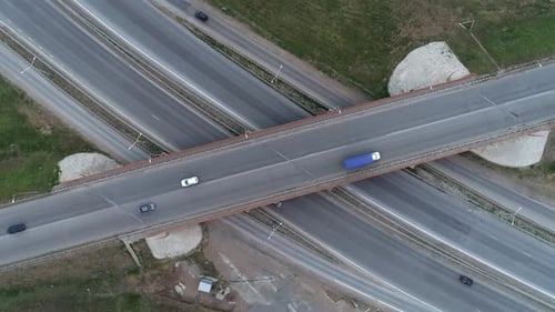 Aerial Top Down View of Highway Interchange Junction Road with Traffic Shot with Camera Rotation