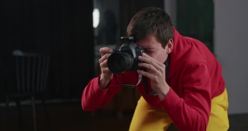 Happy Guy Photographer Professional Shoots Model in Studio Behind the Scenes