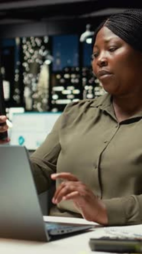 Vertical Video Manager Joining Remote Webinar From Office Using Her Smartphone App