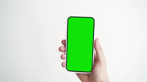 Young Person Use Smartphone with Green Screen Chroma Key Closeup POV