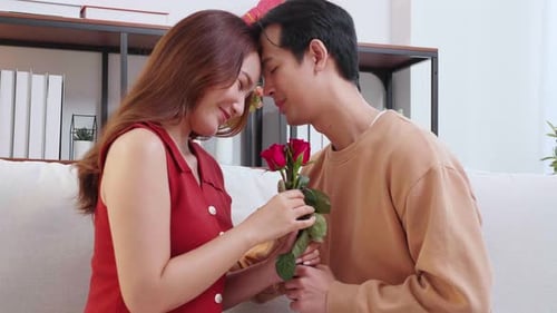 Loving Couple Celebrating Valentine's Day with Flowers