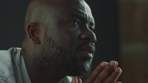Man Contemplating, Looking Upwards Close Up