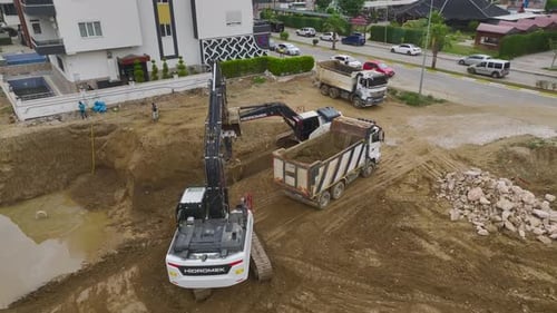 Aerial View Building Begins First Concrete and Heavy Machines in Action