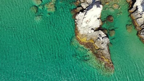 Aerial footage of a perfectly crystal clear blue turquoise water in Rhodes island, Greece. Beautiful