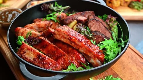 Grilled Meat Platter with Ribs, Steak, and Potatoes