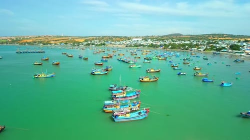 Hundreds of Boats are Anchored in the Sea on a Sunny Day This is a Bay for Boats Avoiding Storms
