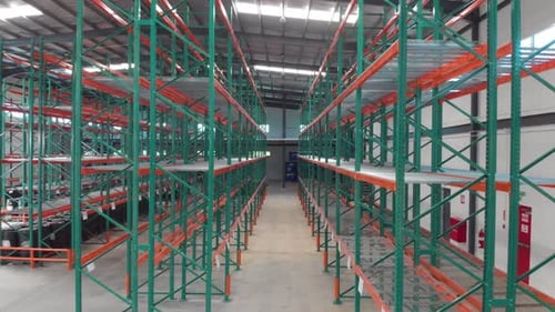 Full view of empty racked pallets in a warehouse
