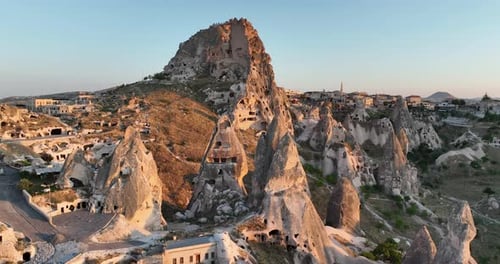 Aerial View of Natural Rock Formations in the Sunset Valley with Cave Houses in Cappadocia Turkey