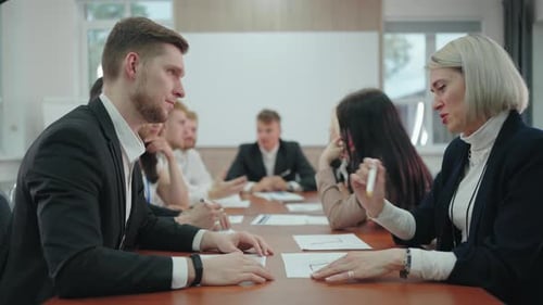 Financial and Marketing Specialists are Communicating in Business Meeting in Conference Hall
