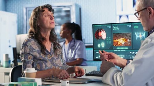 Male Old Healthcare Provider Conducts a Concussion Test in a Medical Clinic