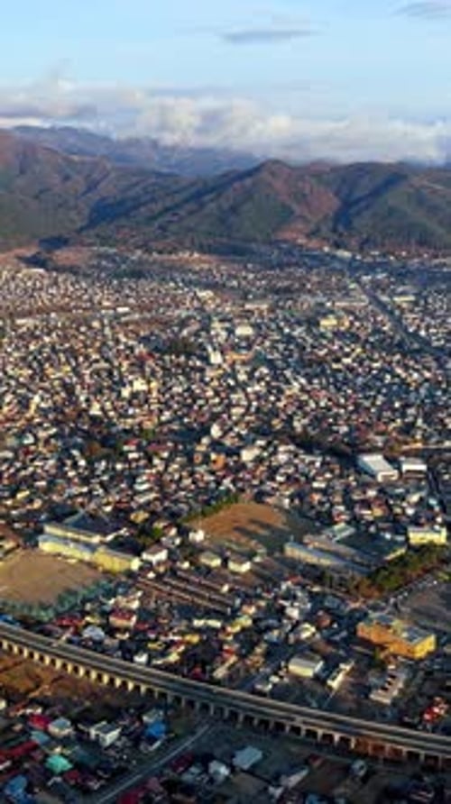 Aerial drone view of the Fujikawaguchiko town, Japan in daylight