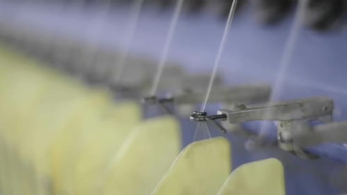Machinery Working to Produce Textile Fabric