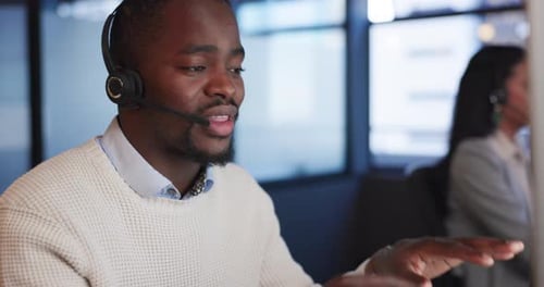 Telemarketing, call center and black man with customer service, help desk or communication