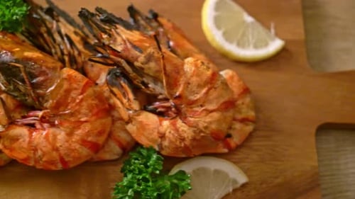 Grilled Tiger Shrimp Garnished with Lemon and Parsley