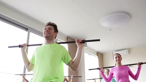 Fitness, Sport, Training, Gym and Lifestyle Concept - Group of People Exercising