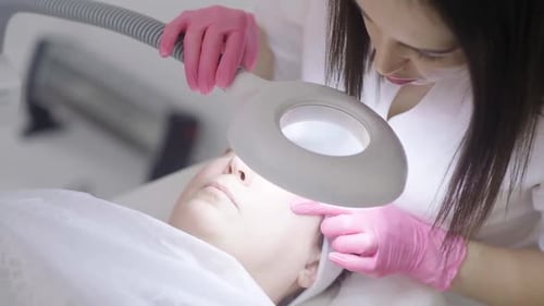 Facial Treatments Such As Peels and Lifting Massages to a Client at an Aesthetic Medicine Clinic
