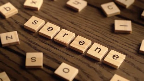 Wooden Letter Tiles Spelling Serene Close Up