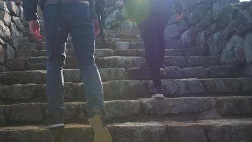Couple Hiking Mountain Stairs in Lake Placid