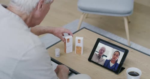 Senior Telehealth Appointment With Doctor on Tablet