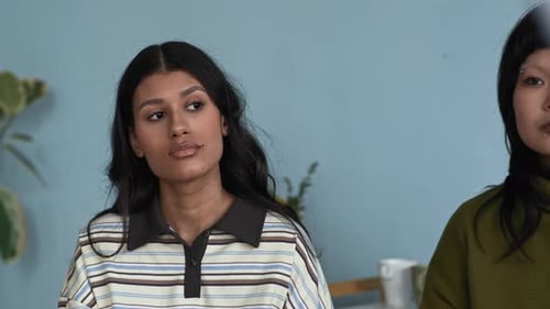 Two Young Adults in a Room