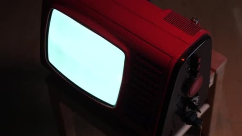 Retro Red Television Showing White Noise on Screen