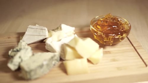 honey dripping from spoon