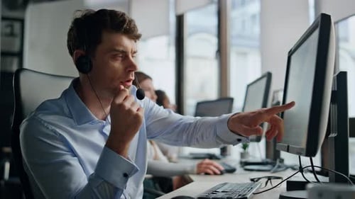 Helpful Agent Working Customer Support Office Serious Man Professional Talking