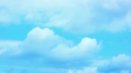 Time-lapse of Moving White Clouds in a Blue Sky