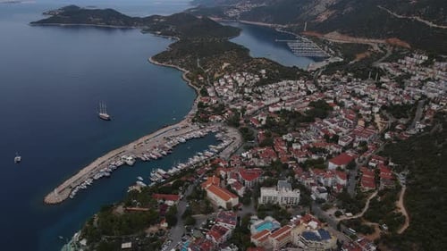 Aerial The Sea Coastal City on the Rocky Coast at Sunset