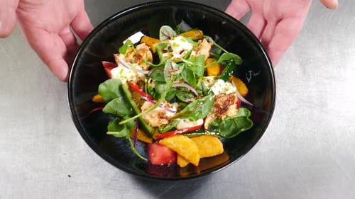 Prepared Salad Bowl Displayed By Chef