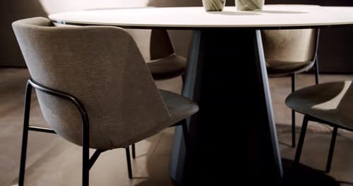 Close Up Fabric and Textile Modern Brown Gray Chair with Round Dinner Table