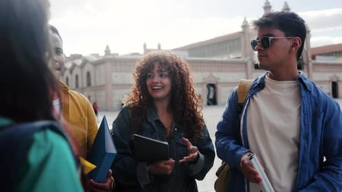 Diverse group of students having fun after class in high school. Friends college