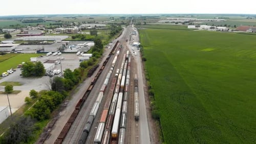 Aerial View of Multiple Trains at Station Waiting to Depart