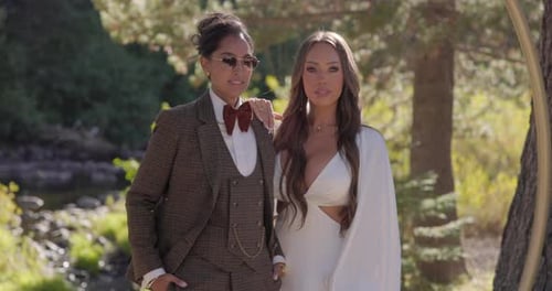 Stylish Women Posing at Outdoor Wedding