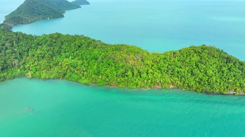 Paradise Island coastal rainforests in Thailand captured from above. 4K.