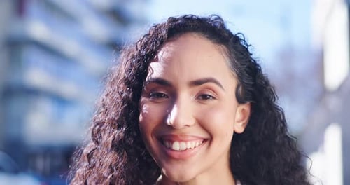 Face, smile and happy with a woman in the city during the day on a commute for travel in summer