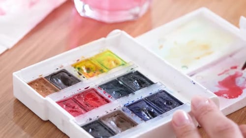 Water Brush Picking Up Red Watercolor Paint