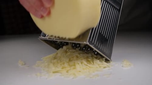 Cheese Being Grated Close Up